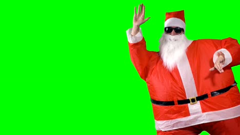 Santa-Claus-entra-en-la-toma-y-hace-gestos-de-saludo.