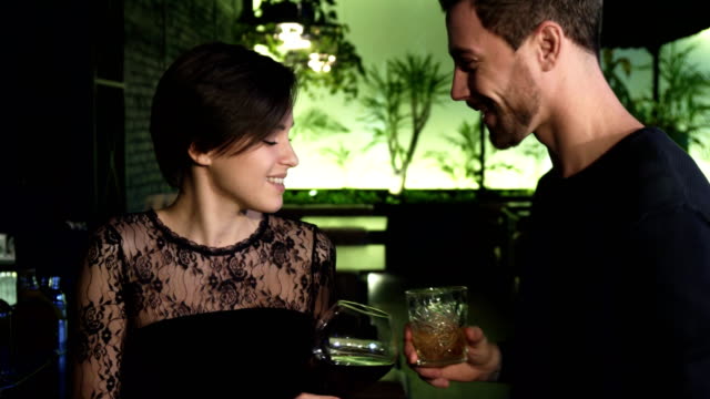 Young-woman-meeting-her-male-friend-at-the-bar