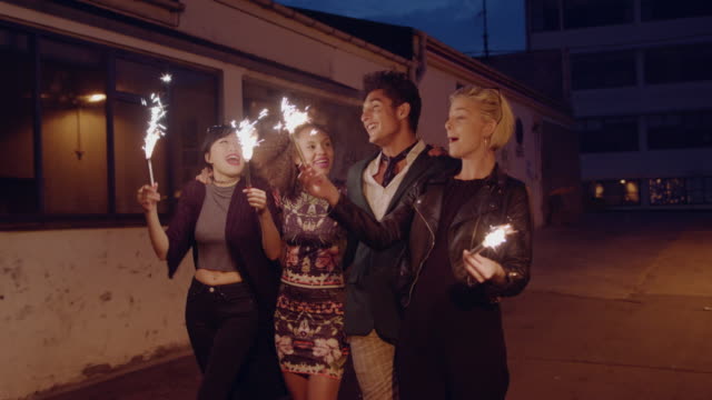 Best-friends-celebrating-new-years-eve-with-sparklers