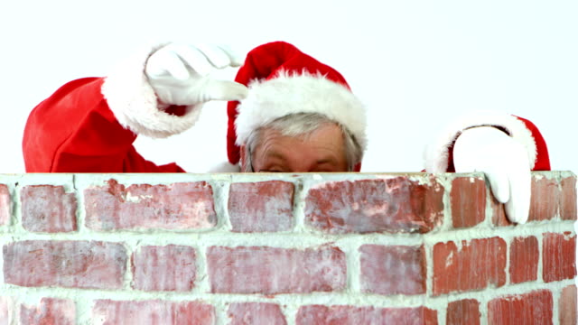 Santa-Claus-ein-Kamin-hinauf-klettern