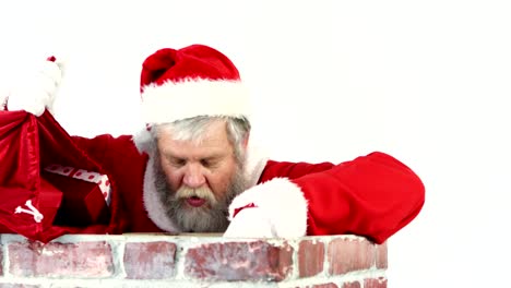 Santa-Claus-Platzierung-Geschenk-Box-in-einem-Schornstein