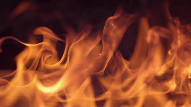 Closeup-of-fire-burning-on-black-background-in-slow-motion