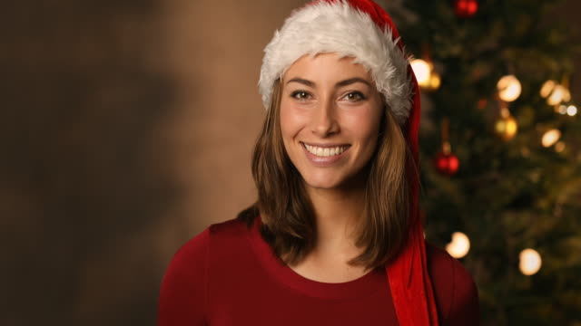 Chica-de-Navidad-sombrero-de-Santa