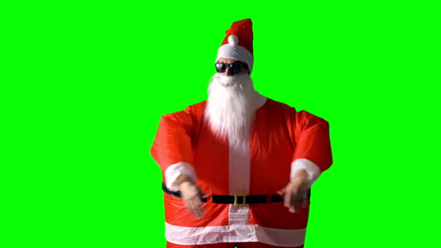 Weihnachtsmann-auf-einem-grünen-Hintergrund-klatscht-in-die-Hände-bei-der-Genehmigung.