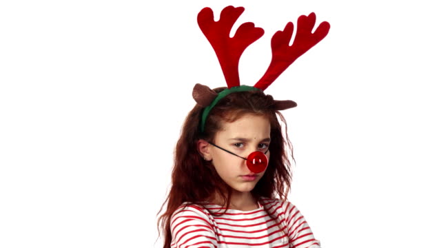 A-sweet-girl-dressed-in-a-toy-red-nose-and-looks-very-resentful