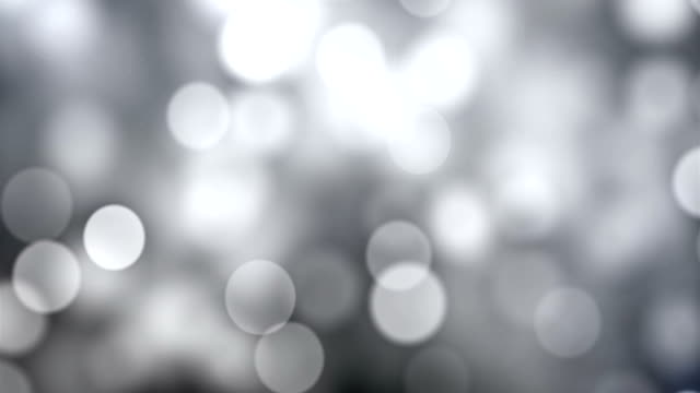 white-moving-Abstract-blinking-glowing-Glittering-bokeh-Backdrop