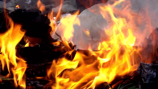 Fire-slow-motion-burning-on-garbage-pile-to-air-pollution
