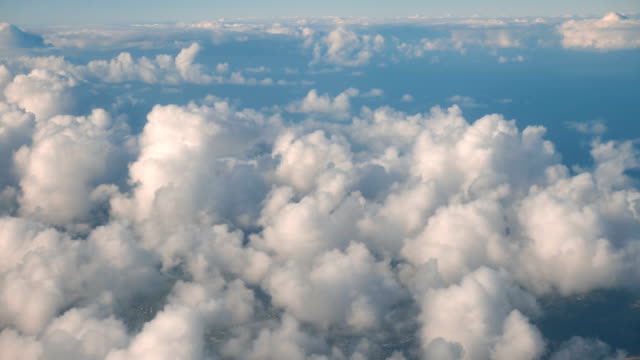 Aerial-shot-above-the-clouds-in-4K-slow-motion