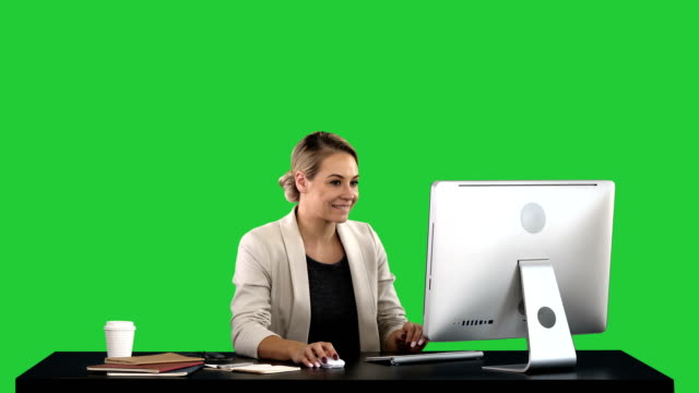 From-early-morning-I-am-checking-my-mailbox-Exciting-woman-working-on-computer-on-a-Green-Screen,-Chroma-Key