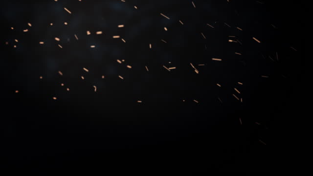 Funkenflug-Feuer-mit-Rauch,-abstrakte-Animation-von-fliegenden-Teilchen-mit-Motion-blur-4K