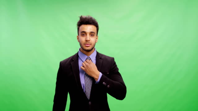 Handsome-Businessman-Fixing-Hair-Happy-Smiling-Portrait-Young-Business-Man-Wearing-Suit-Over-Chroma-Key-Green-Screen