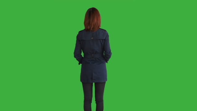 Young-Asian-Women-Standing-Isolated-Against-Green-Screen-Background.-Portrait-of-Chinese-Female-Person.