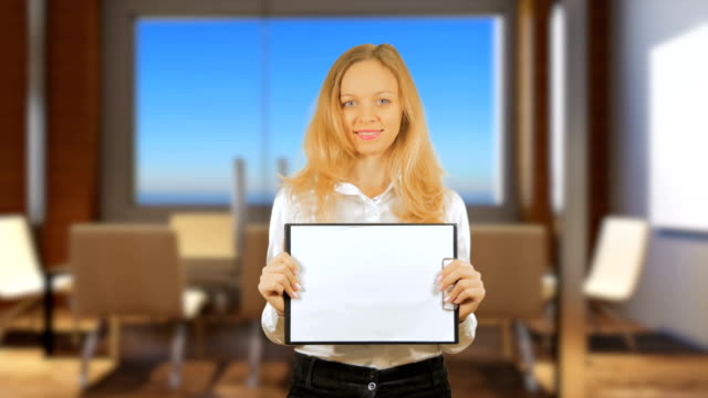 4k.-Business-woman-holding-a-sign.--Isolated-on-a-background.-Mockup-.-chromakey