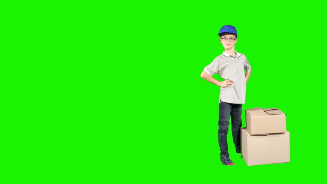 Little-deliveryman-with-boxes-at-chroma-key-background