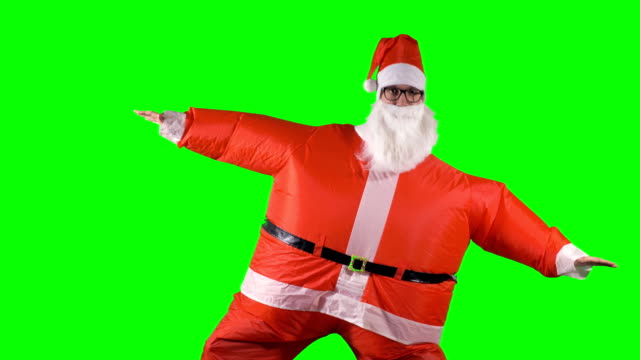 Santa-Claus-Tänze-auf-grünem-Hintergrund-verschiedene-Bewegungen.