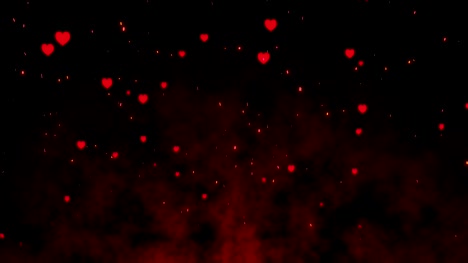 4K-animation-Lot-of-sparks-heart-shape-from-large-bonfire-in-slow-motion.-Beautiful-abstract-background-on-the-theme-of-fire,-Motion-Graphic-and-animation-background.-Valentine-Day.