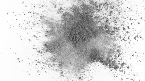 Gray-powder-exploding-on-white-background-in-super-slow-motion