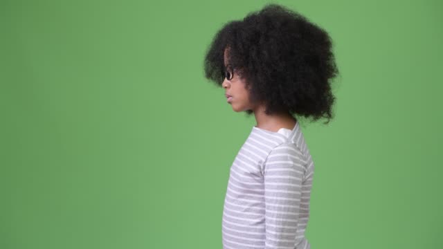 Profile-view-of-young-cute-African-girl-with-Afro-hair