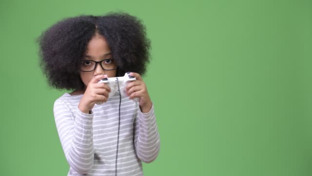 Young-cute-African-girl-with-Afro-hair-playing-games