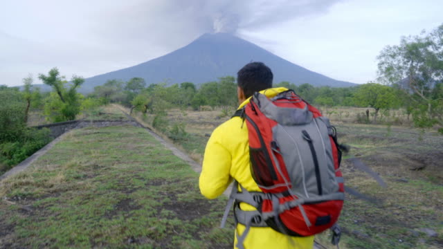 Hiker-Running-to-Erupting-Volcano