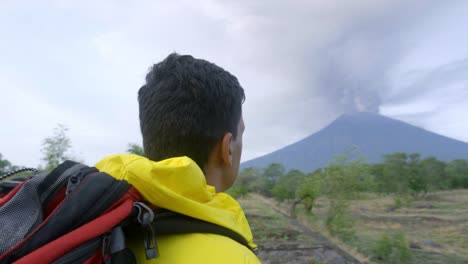 Hiker-Watching-Volcano-Eruption