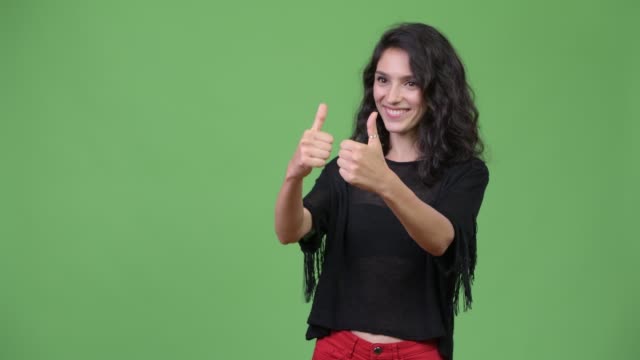 Young-beautiful-woman-giving-thumbs-up
