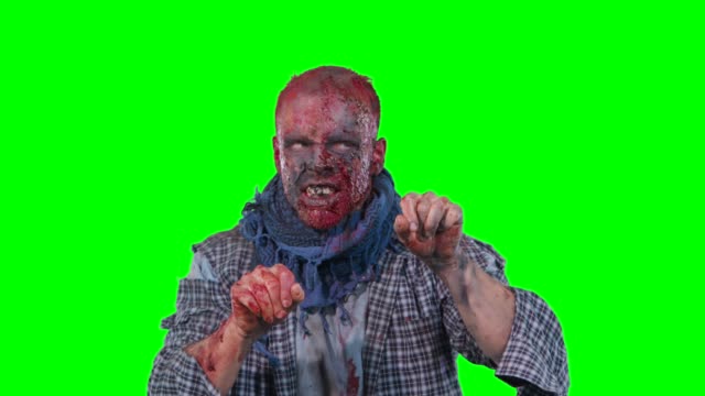 Gruselige-Zombie-Halloween-isoliert-grün-Hintergrund