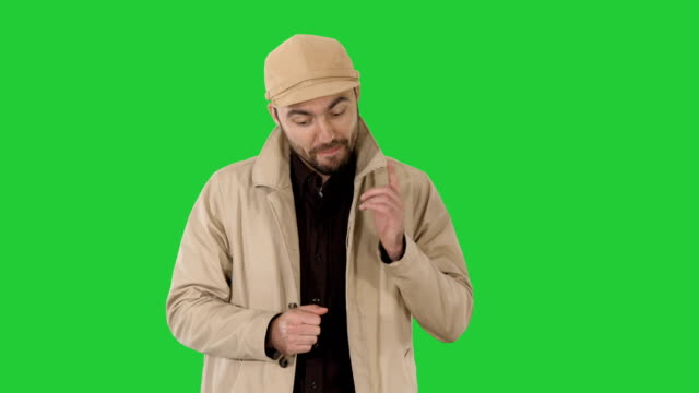 Handsome-young-thoughtful-man-has-a-wonderful-idea-on-a-Green-Screen,-Chroma-Key