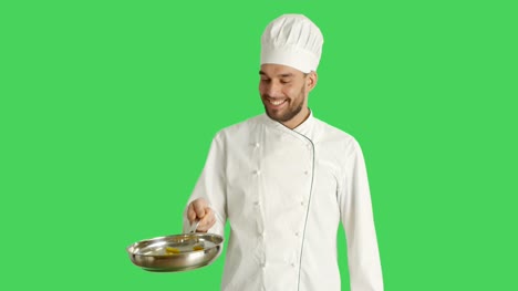 Mid-Shot-of-a-Chef-Tossing-Up-Macaroni-on-Pan-and-Making-Bellissimo-Gesture.-Background-Green-Screen.