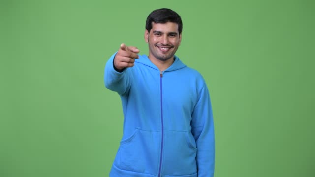 Young-handsome-Persian-man-pointing-at-camera