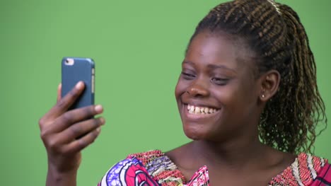 Young-African-woman-using-phone