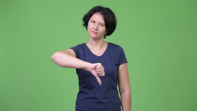 Beautiful-woman-with-short-hair-giving-thumbs-down