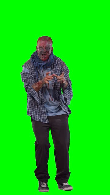 Scary-zombie-in-halloween-isolated-green-background