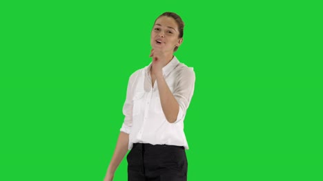 Positive-human-emotions-Happy-emotional-girl-laughing-from-the-bottom-of-her-heart-on-a-Green-Screen,-Chroma-Key