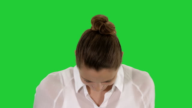 Cheerful-woman-laughing-Face-expressions-on-a-Green-Screen,-Chroma-Key