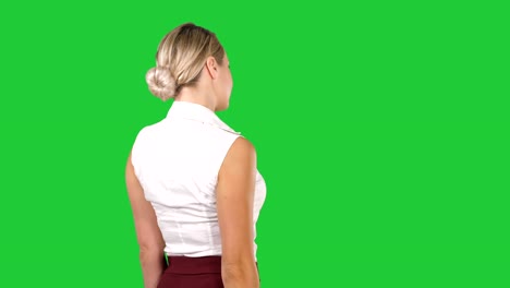 Business-woman-placing-hands-on-hips-on-a-Green-Screen,-Chroma-Key