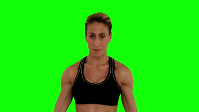 Super-fit-woman-flexing-her-arms