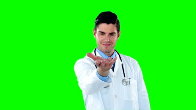 Doctor-pretending-to-hold-a-invisible-object