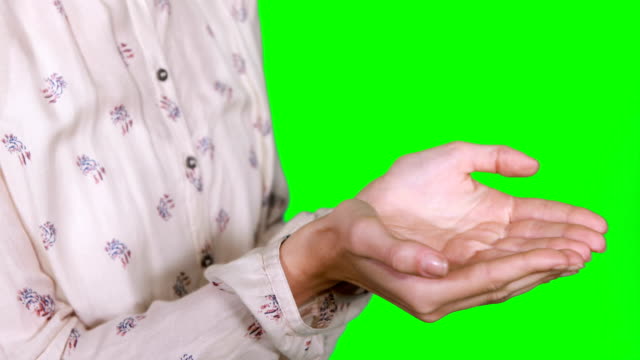 Woman-pretending-to-touch-an-invisible-object
