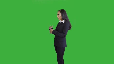 Lifestyle-Portrait-of-Young-African-American-Business-Woman-Isolated-on-Green-Screen-Chroma-key-Background