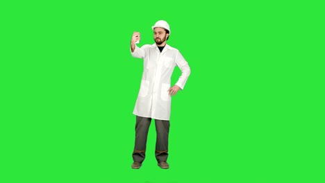 Engineer-or-architect-taking-a-selfie-showing-gesture-on-a-Green-Screen,-Chroma-Key