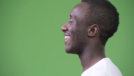 Profile-view-of-young-happy-African-man-relaxing-with-eyes-closed