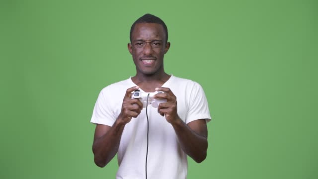 Young-excited-African-man-playing-games