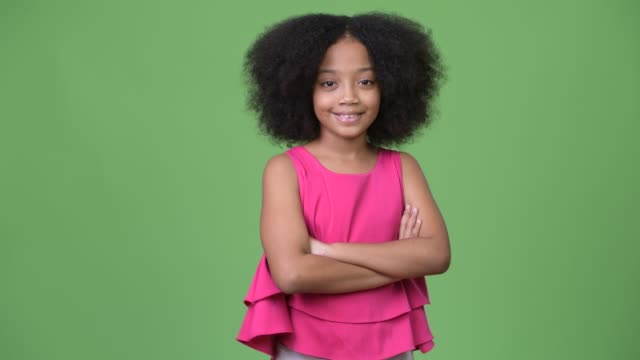 Young-cute-African-girl-with-Afro-hair-crossing-arms