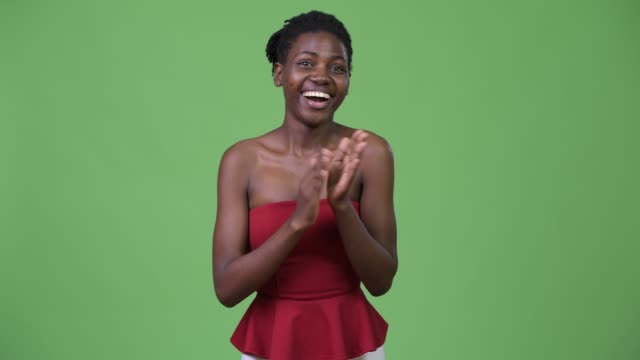 Young-beautiful-African-woman-clapping-hands
