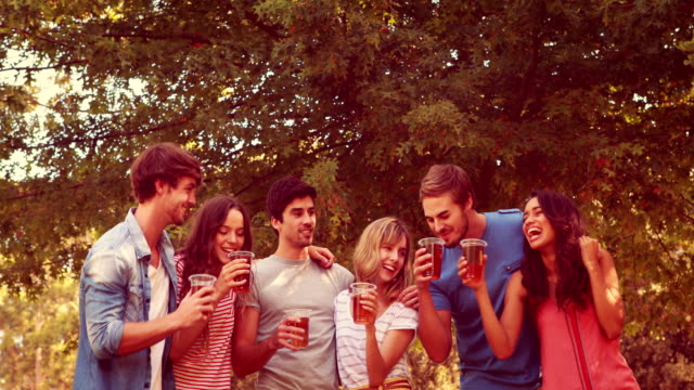 Happy-friends-toasting-in-the-park