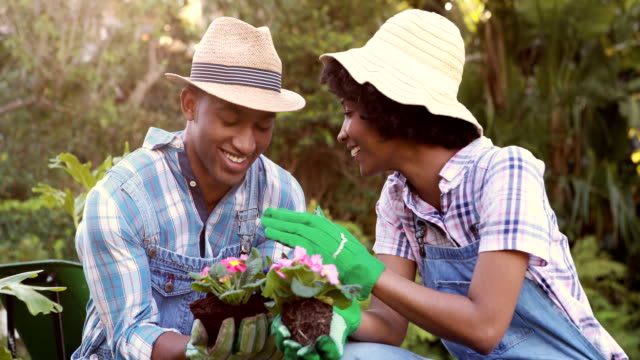 Happy-couple-gardening-in-the-park