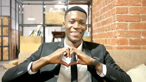Handmade-Heart-Sign-by-Black-Businessman