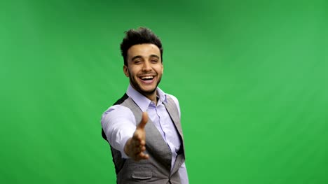 Businessman-Offer-Hand-For-Handshake-Happy-Smiling-Portrait-Young-Latin-Business-Man-Handshaking-Welcome-Over-Chroma-Key-Green-Screen