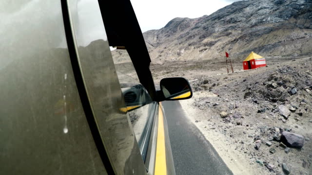 4K-footage-of-a-car-going-through-the-desert